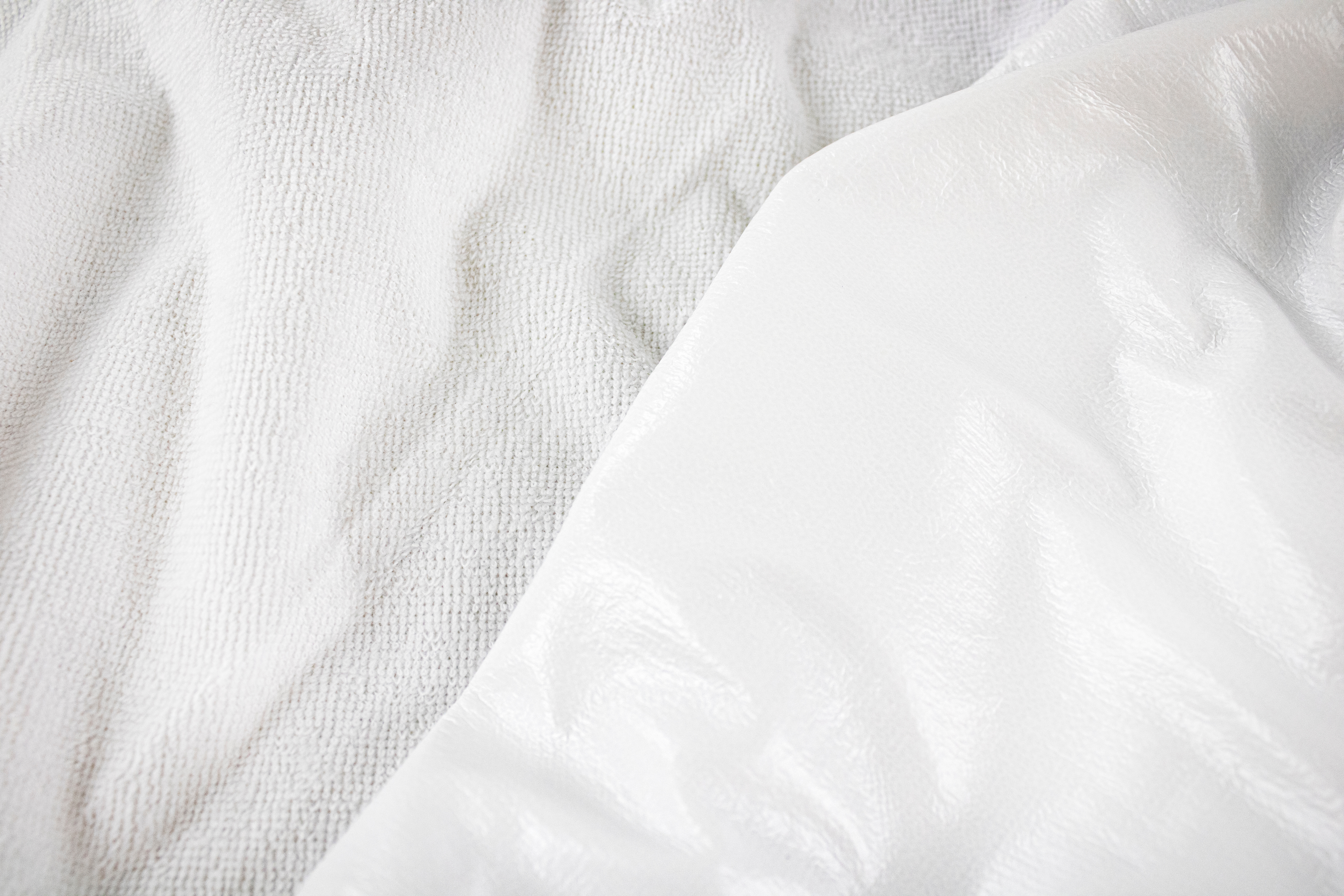 White texture close-up of material for making waterproof mattres Premium Waterproof Mattress Protector by Renee Taylor Double - Image 1