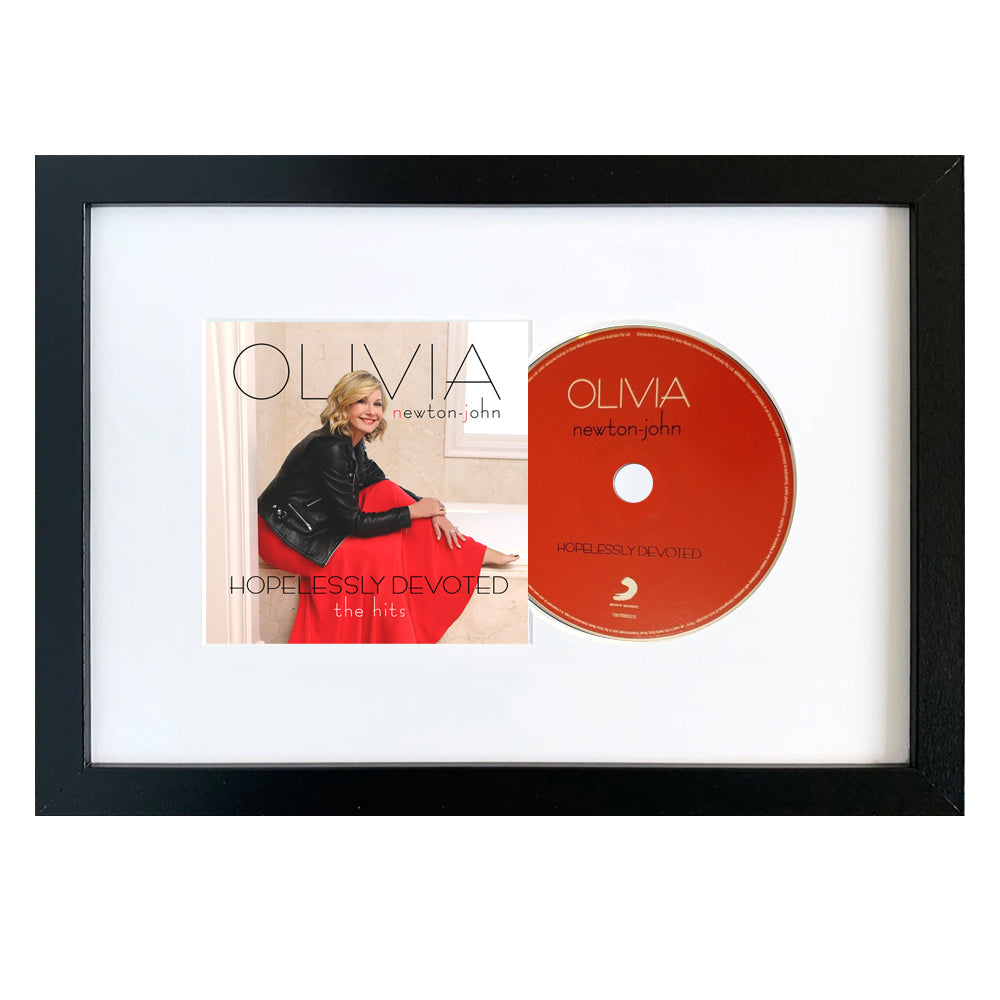 V398-SM-19075855512-FD-202506231719-00 Olivia Newton John Hopelessly Devoted - The Hits CD Framed Album Art - Image 1