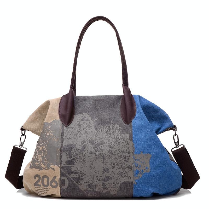 V562-B1065274850DBT-202504251712-00 Blue Graffiti Canvas Shoulder Bag - Large Capacity - Image 1