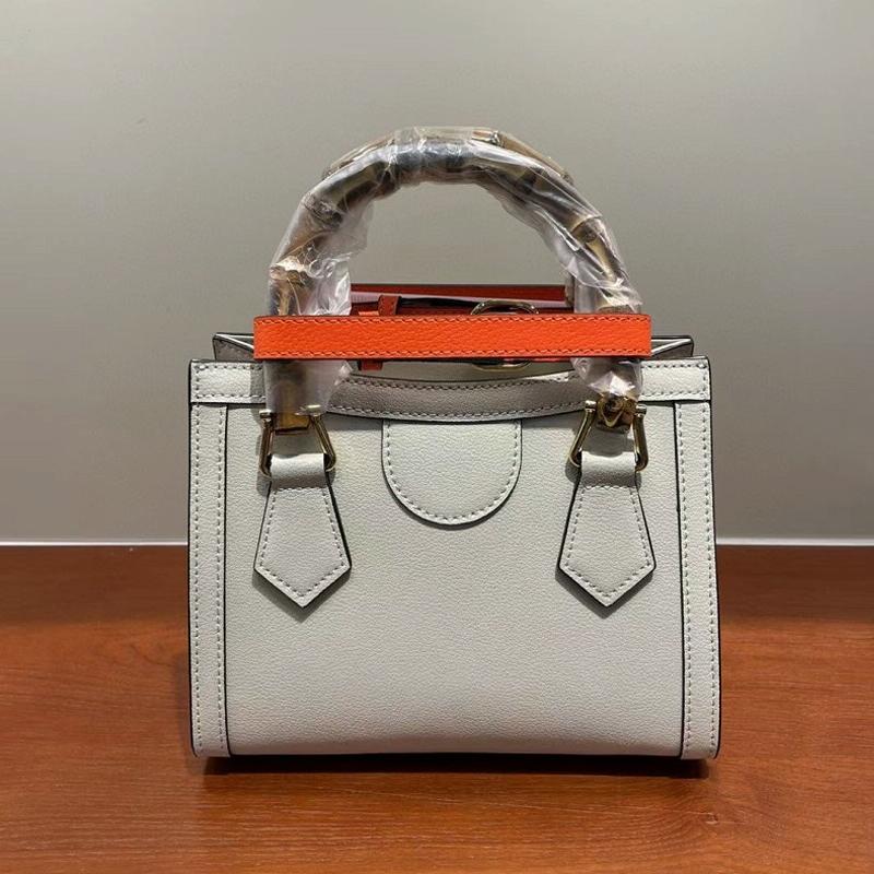 V562-D104823050DBT-202504251516-00 Versatile Bacchus Shoulder Bag in First Layer Cowhide - Off White - Image 1