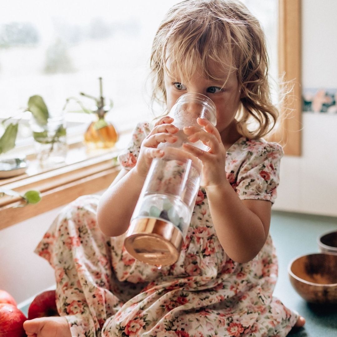 V573-CWBGBRQ-140187-00 Rose Gold Crystal Bottle with Gemstone Base and Tea Infuser - Image 1
