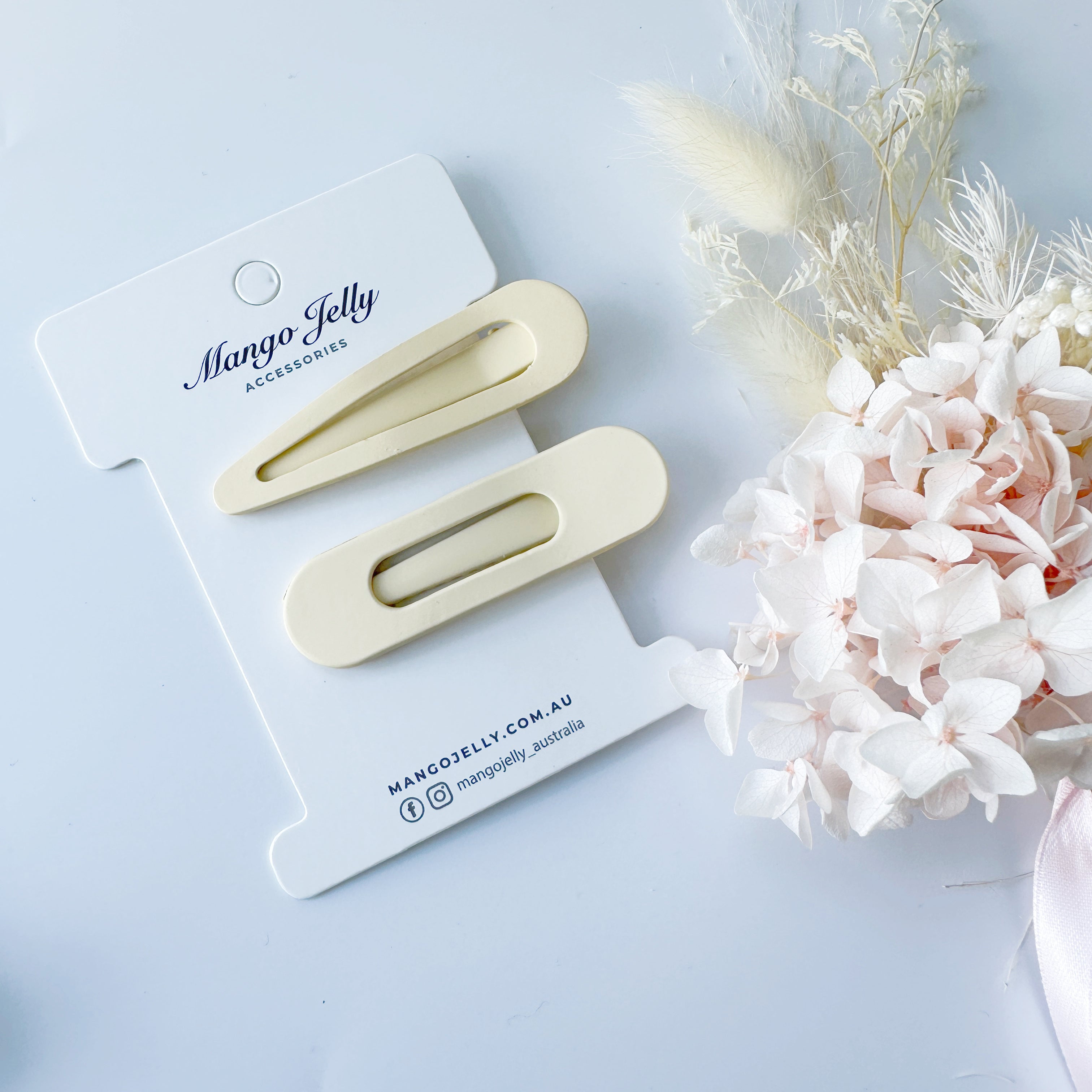 V659-HC-PASTELCOATED-ALI-CREAM-2-L-160767-00 MANGO JELLY Large Pastel Coated Hair Clips - Cream - Twin Pack - Image 1