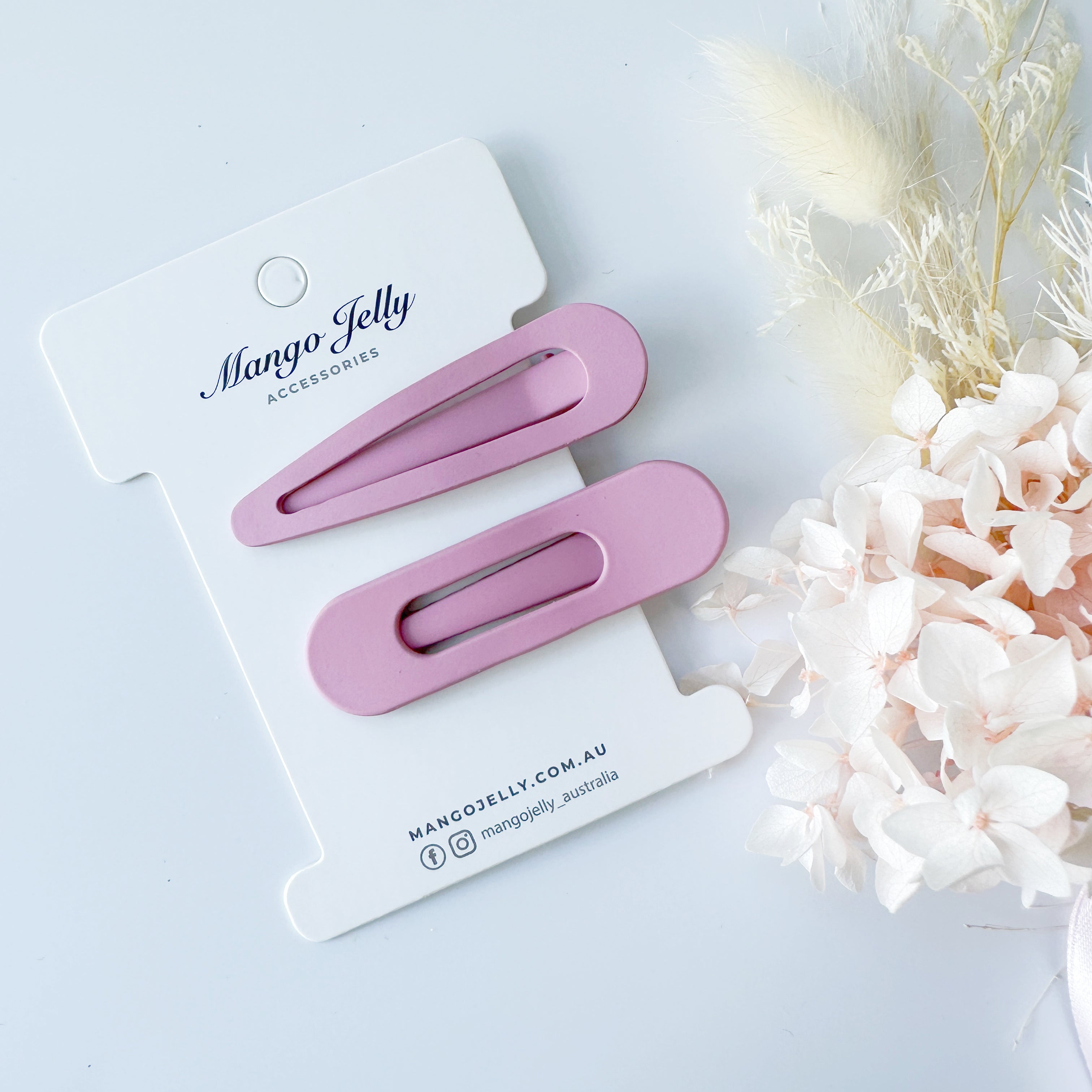 V659-HC-PASTELCOATED-ALI-PINK-2-L-160759-00 MANGO JELLY Large Pastel Coated Hair Clips - Pink - Twin Pack - Image 1