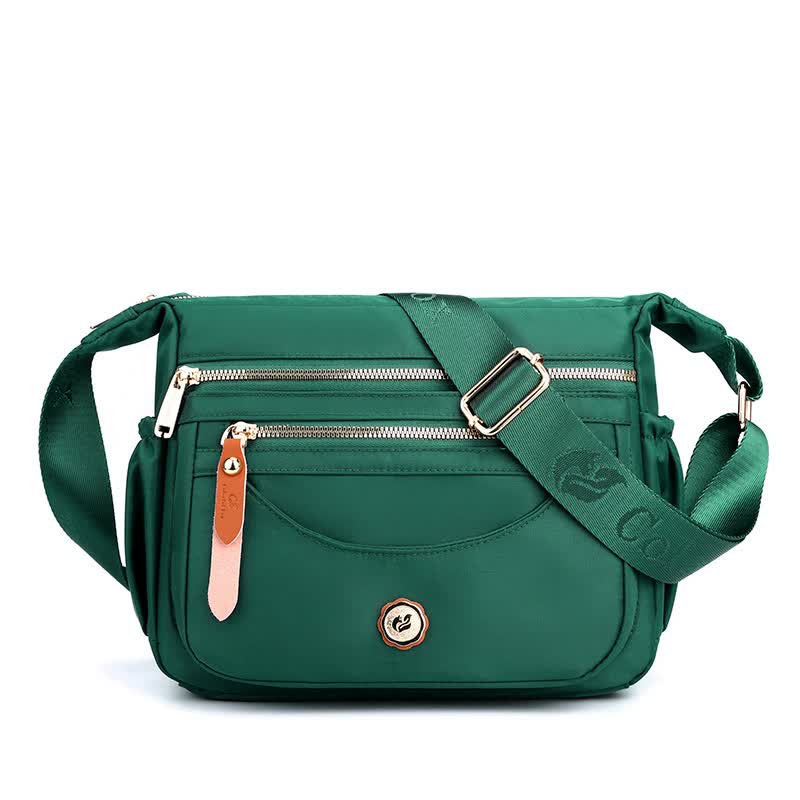 V888-ELOSUNG15677-214963-00 Green Nylon Crossbody Bag with Multiple Compartments - Compact and Stylish Design - Image 1