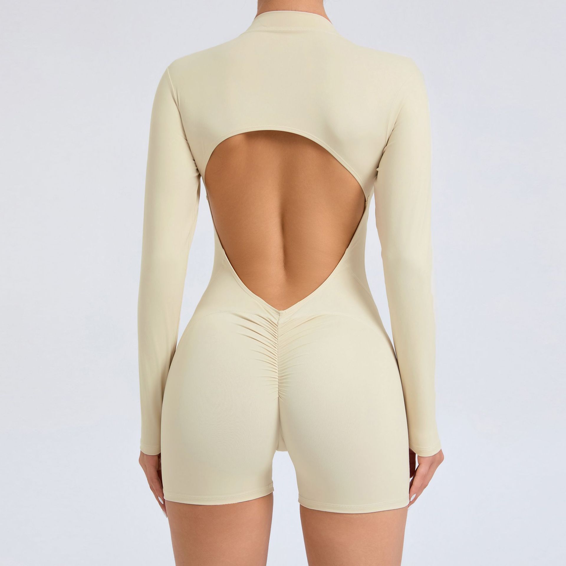 V888-ELOSUNG16891-224835-00 S Beige Backless Scrunch Butt Workout Jumpsuit - Long-Sleeve Open-Back Yoga Romper - Image 1