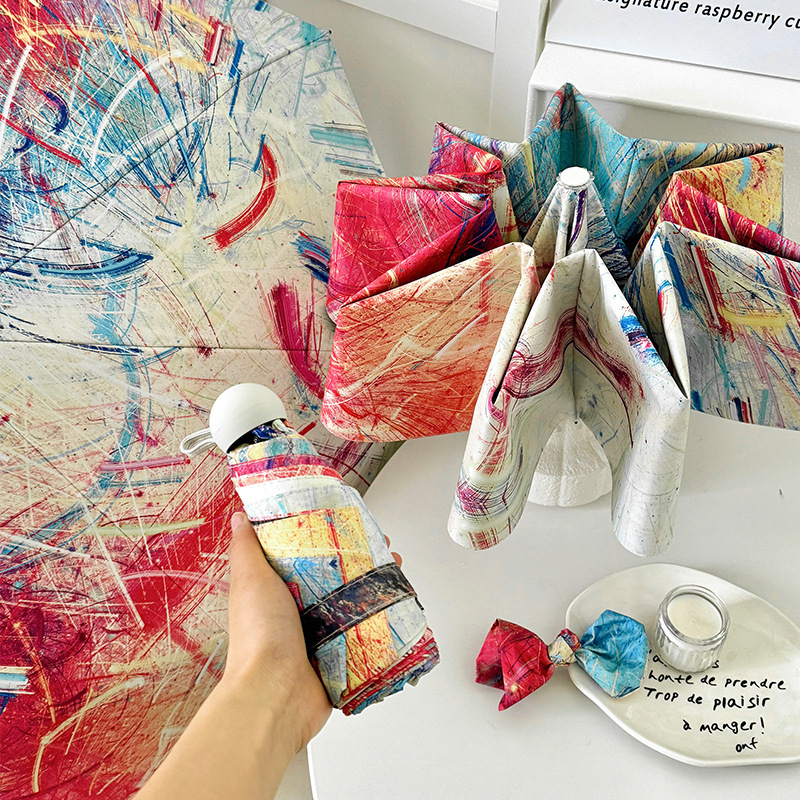 V888-ELOSUNG22295-202503211641-00 Color Graffiti Mini 5-Fold Umbrella - Portable, Anti-UV, Black Glue Coating - Image 1