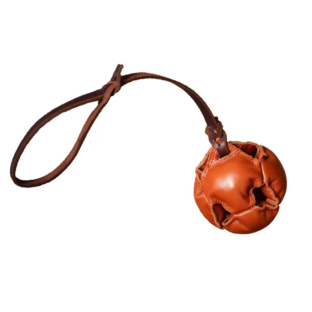 V888-ELOSUNG27884-202505231111-00 Brown Durable Leather Dog Training Ball with Loop Handle - Interactive Bite & Tug Toy for Playful Pups - Image 1