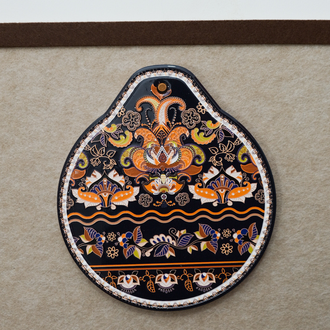 V888-ELOSUNG28023-202504281505-00 Orange-black Set of 4 Embossed Ceramic Paddle Mats - Assorted Bohemian Pattern Heat Resistant Pads - Image 1