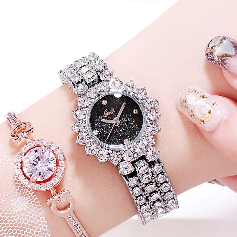 V562-L1051738550DBT-202508282131-00 Women Quartz Bracelet Watch with Diamond Accents - Silver Shell Black Plate - Image 1